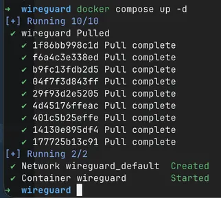 Terminal running docker compose up -d: the WireGuard layers finish downloading, then the wireguard_default network is created and the wireguard container starts